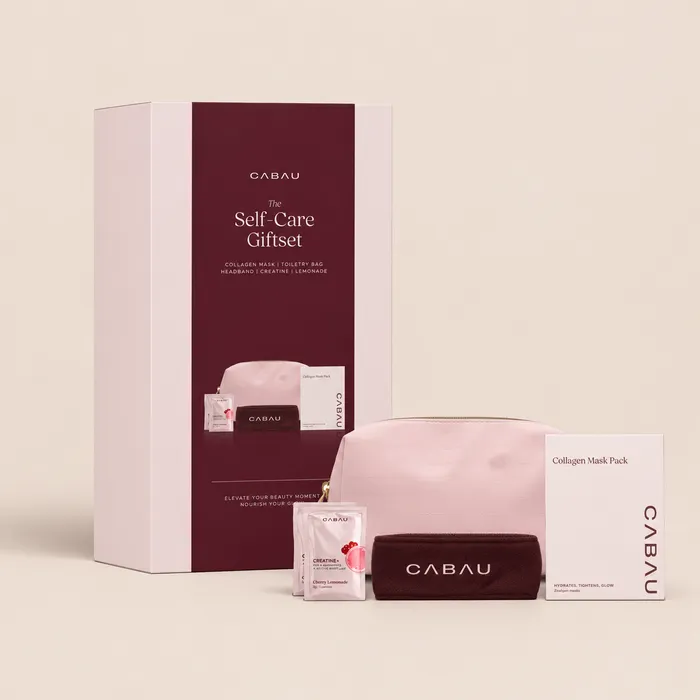 The Self-Care Giftset box with a pink pouch and sachets