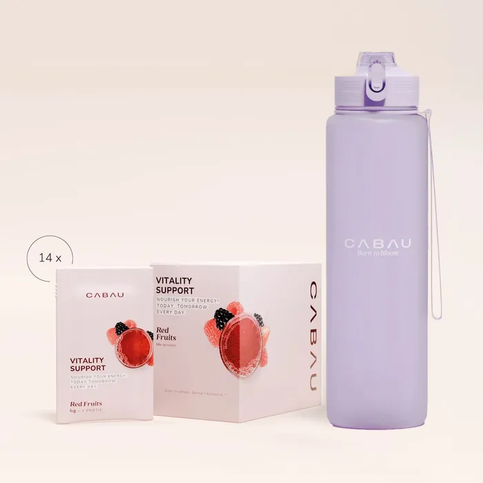 Cabau sips box beside a lilac bottle