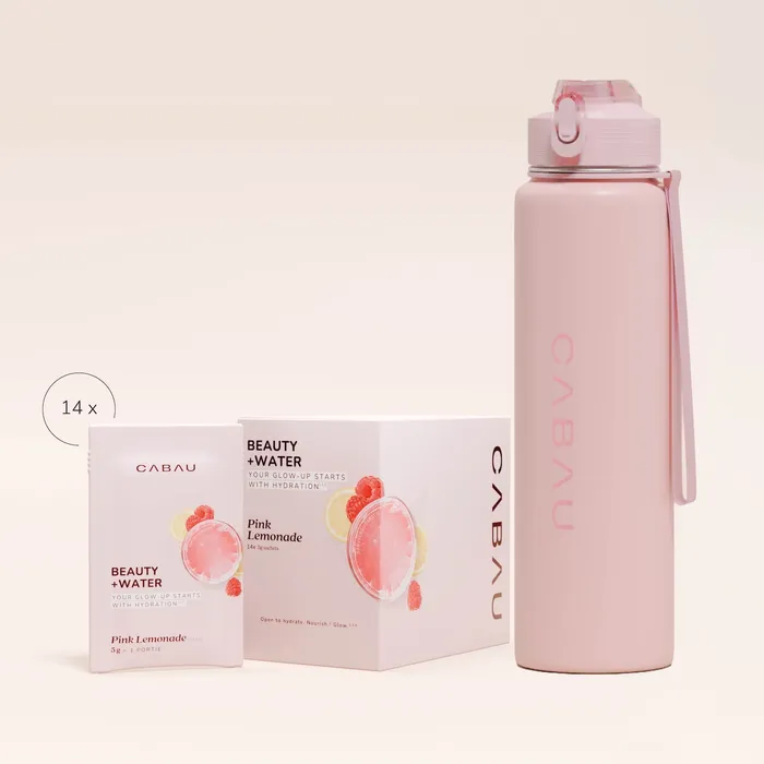Beauty+Water box next to a pink steel bottle