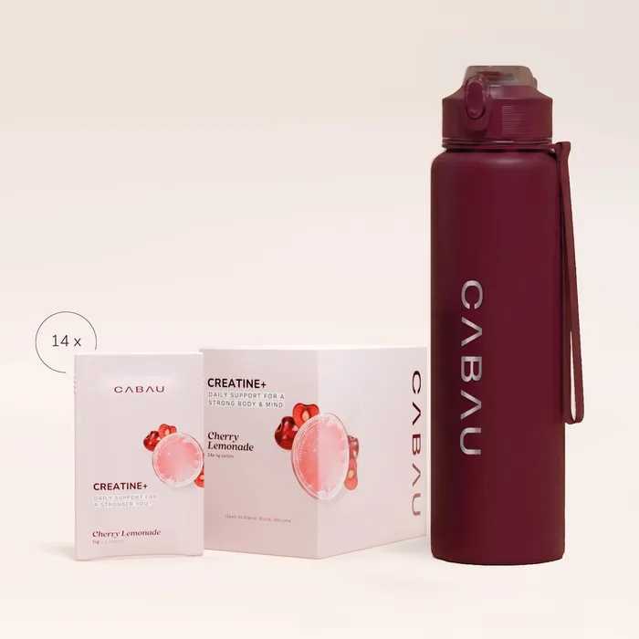 Cherry-red Cabau bottle beside a Sips box
